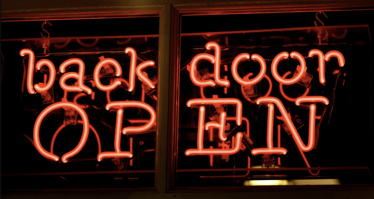 Back door open neon signage.